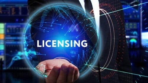 Man holding digital sphere with the word Licensing, representing Novasys IT software licensing solutions